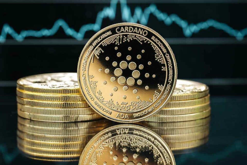 Cardano Münzen mit einem symbolischen Chart im Hintergrund